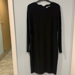 Black  ribkoff  sc long sleeves/sheer.  Sc at neck./waist Zip back.